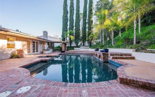 Single-Story Pool Home with resort-style backyard