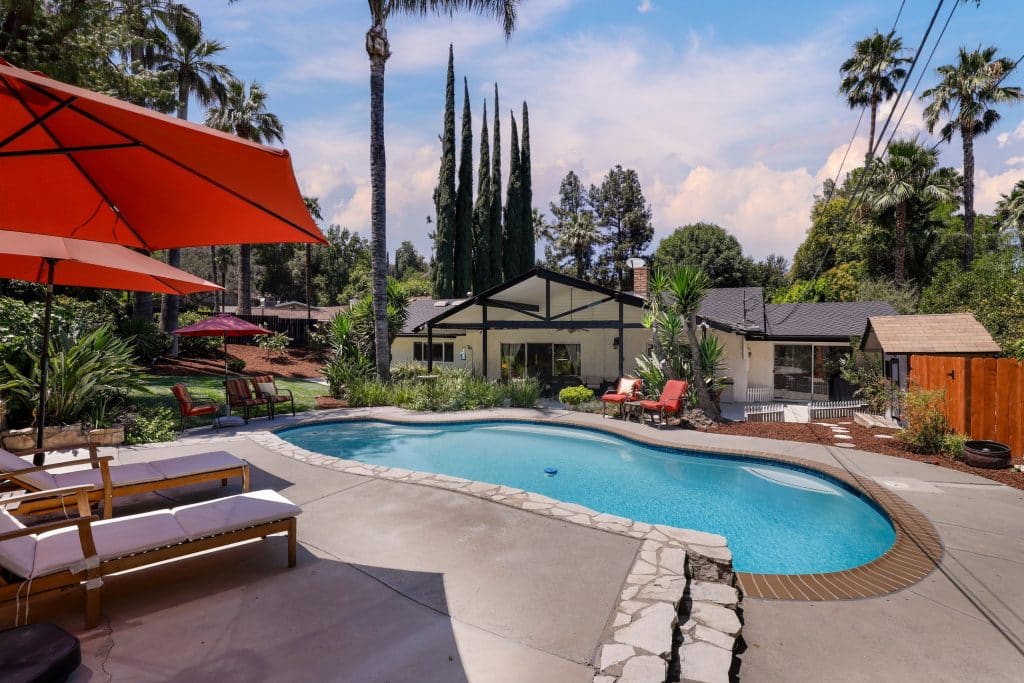 Resort-Style Pool Home on Half-Acre Lot in Woodland Hills